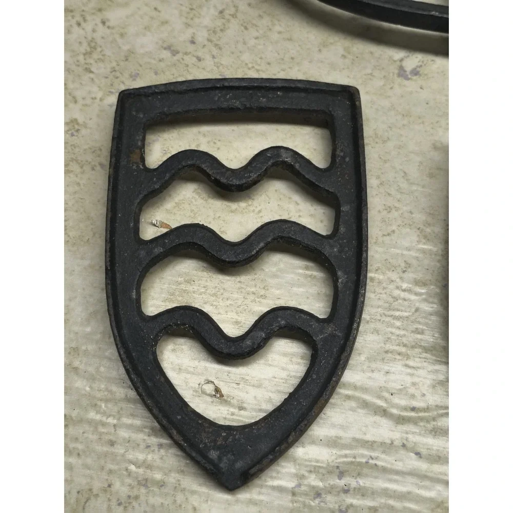 Vintage Black Cast Iron Trivets (set‎ of 3)